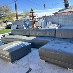 Grey leather sofas