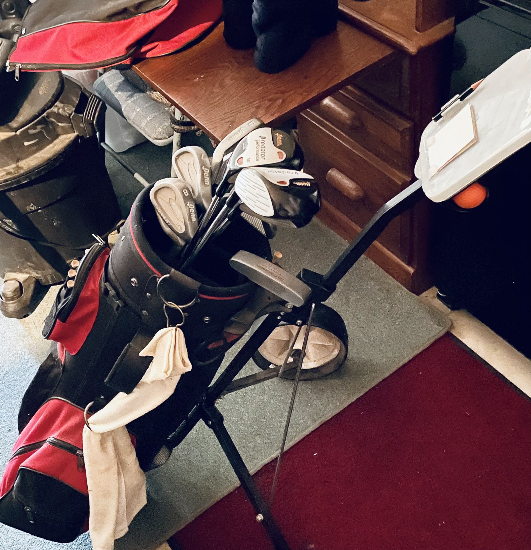 Golf clubs, bag and cart