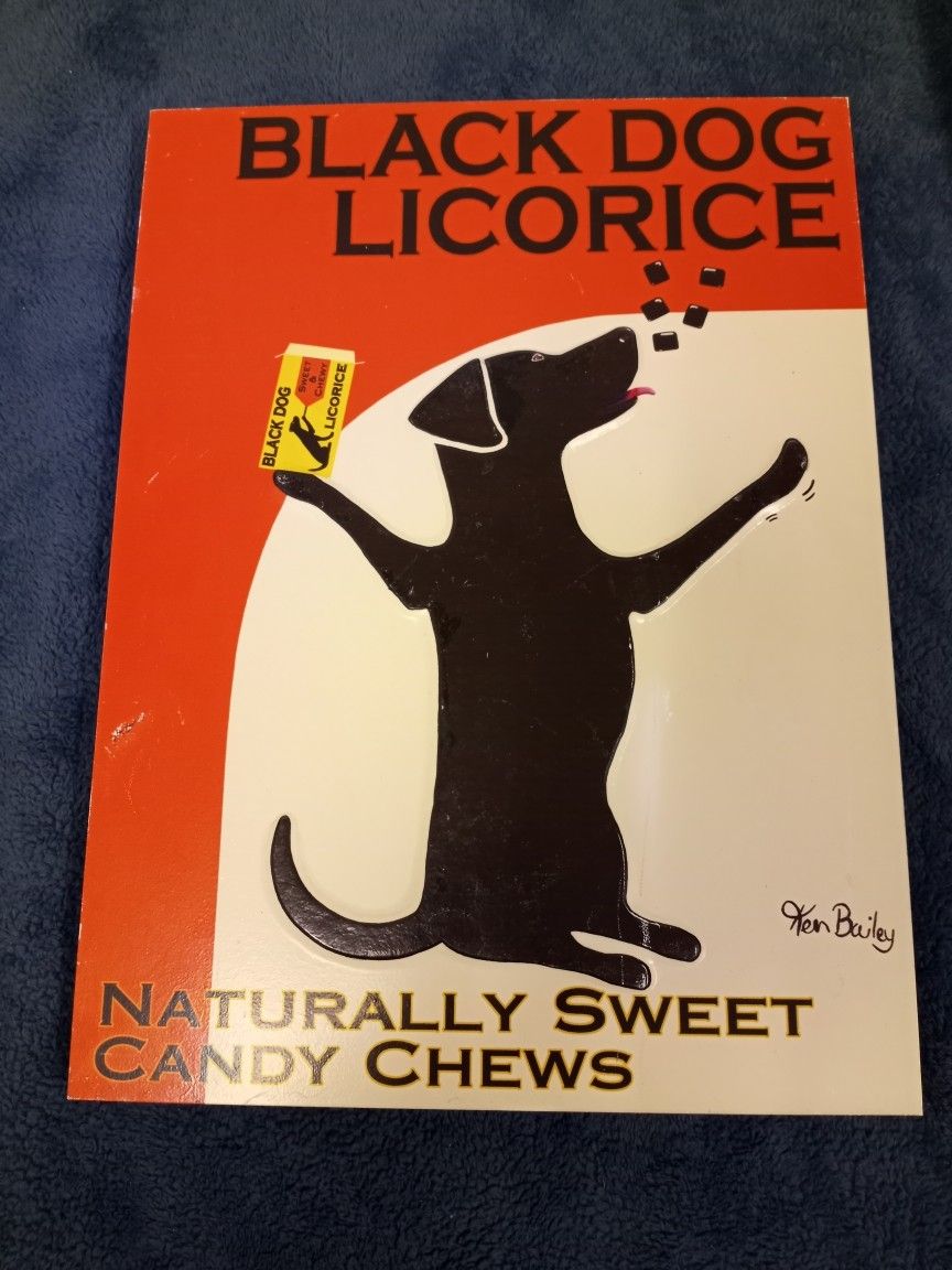 Used Black Dog Licorice Bas-relief Print With Some Scuffs