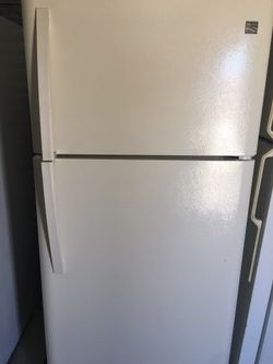 Kenmore beige refrigerator