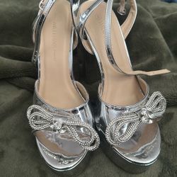 Heels, silver bow, size 8