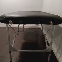 Massage table, foldable