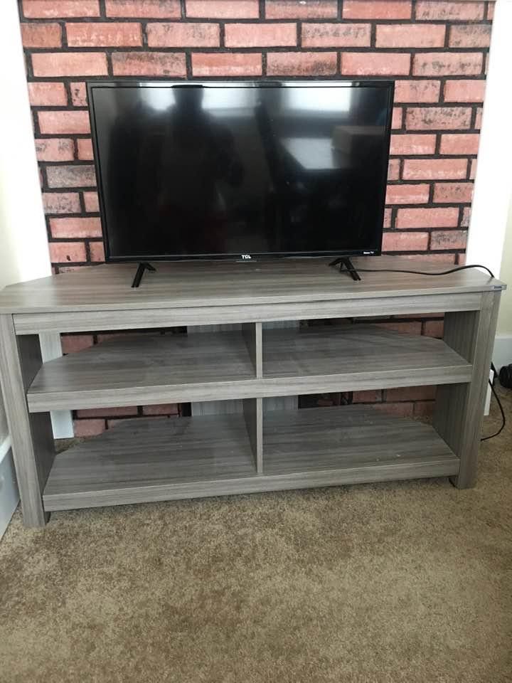 30” roku 1080 hd tv with remote great condition and 58” flat screen tv stand for sale