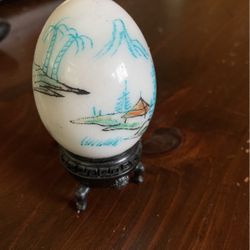 Carved Marble Egg On A Stand