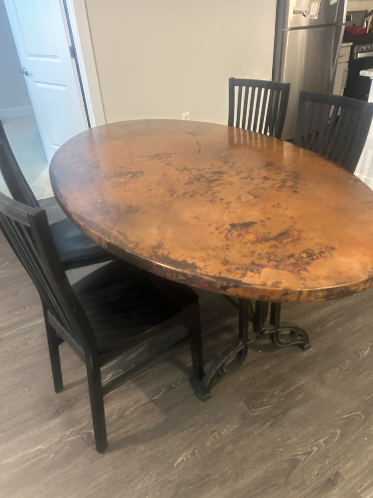   Oval Copper Dinning Table W/ Chairs