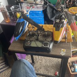 Two Rc Helicopters With 1 Controller And Extra Parts