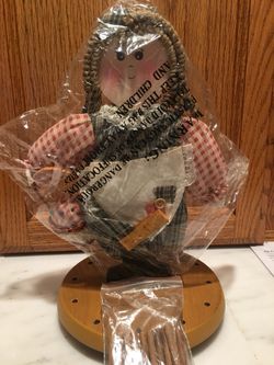 Wooden Sewing organizer for thread , push pins. Doll’s apron pockets for items.