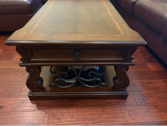 medium decorative wooden brown table with drawers and storage