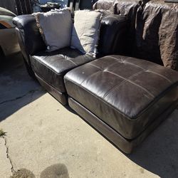 coner chair n ottoman with pillows