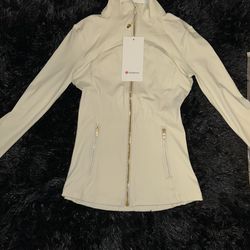 Lululemon cream white top