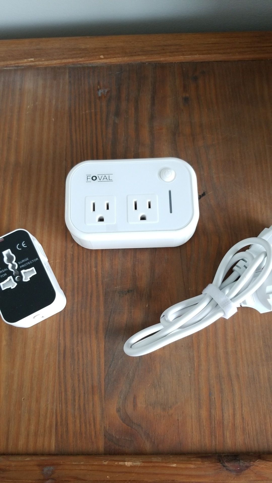 Travel adapter and power converter with universal adapter surge protector