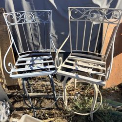 Pair Of Wrought Iron Chairs
