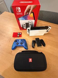 Nintendo Switch OLED Bundle, (3) games, all accessories + carrying case