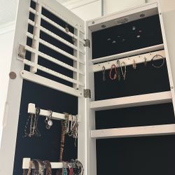 Jewlery  Box Hangs Over The Door 