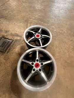 Set of 4 rims and lug nuts.