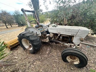 Tractor with a lot of attachments $6000
