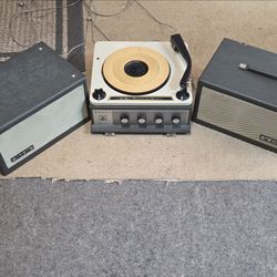 Vintage Record player.  Voice Of Music turn table,  portable.