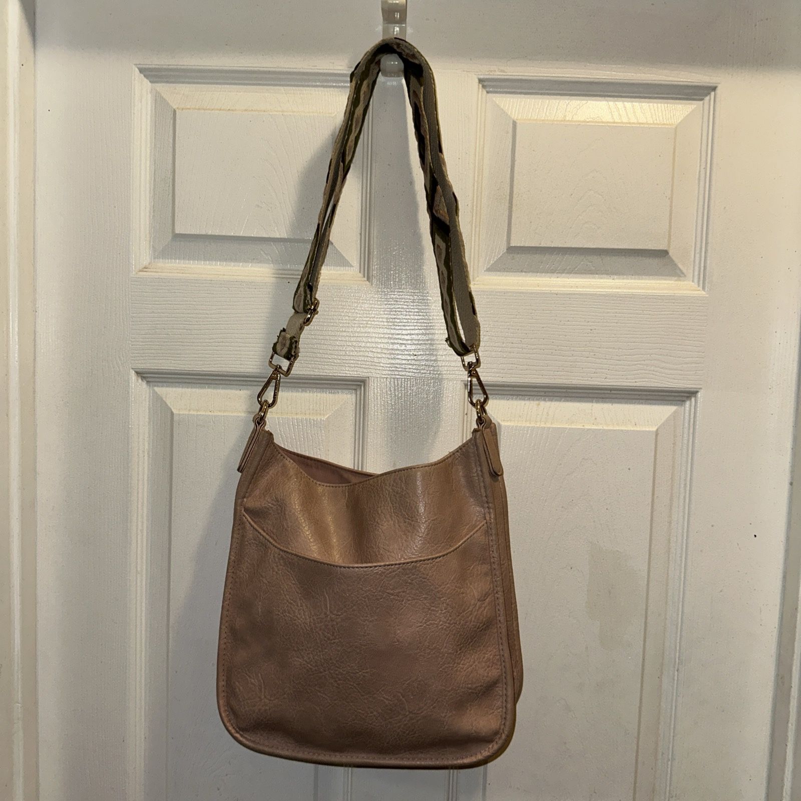 Ahdorned Classic Vegan Leather Messenger Crossbody Bag Light Pink with adjustable strap.