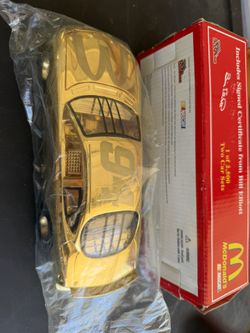 Rare limited-edition Bill Elliott #94 McDonald’s NASCAR 1:24 scale die-cast featuring an authentic 24K gold finish.
