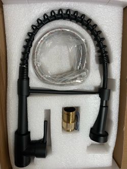 Contemporary Kitchen Faucet Featuring a Single Handle And a High Arch Design, Equipped with a Pull-Down Sprayer in Matte Black And Brushed Nickel End.
