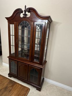 The antique buffet High: 36” inches Wide: 60” inches Deep: 18” inches