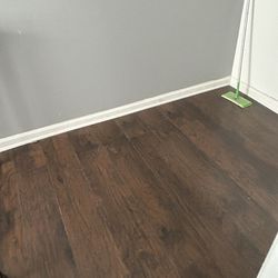 Laminate floor for a 200 sqf space - 2 years old -new pieces included - $50