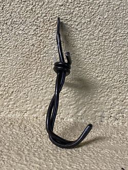Barbed wire hook