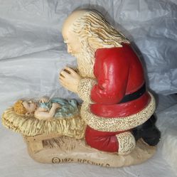 Kneeling Santa praying over Baby Jesus 1976 RP Gauer