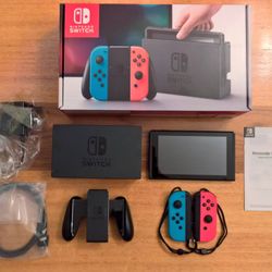 Nintendo Switch w/ Mario Kart, Zelda BotW, Smash Bro’s + downloaded games