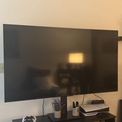 TCL Roku TV 65” 4K UHD + Swivel TV Stand