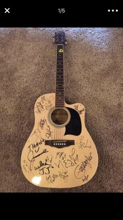 (WILL TAKE TRADES OF DECENT VALUE CARS TRUCKS QUADS DIRTBIKES TRAILERS ECT This guitar is awesome. Iis signed by some of the best comedians out the