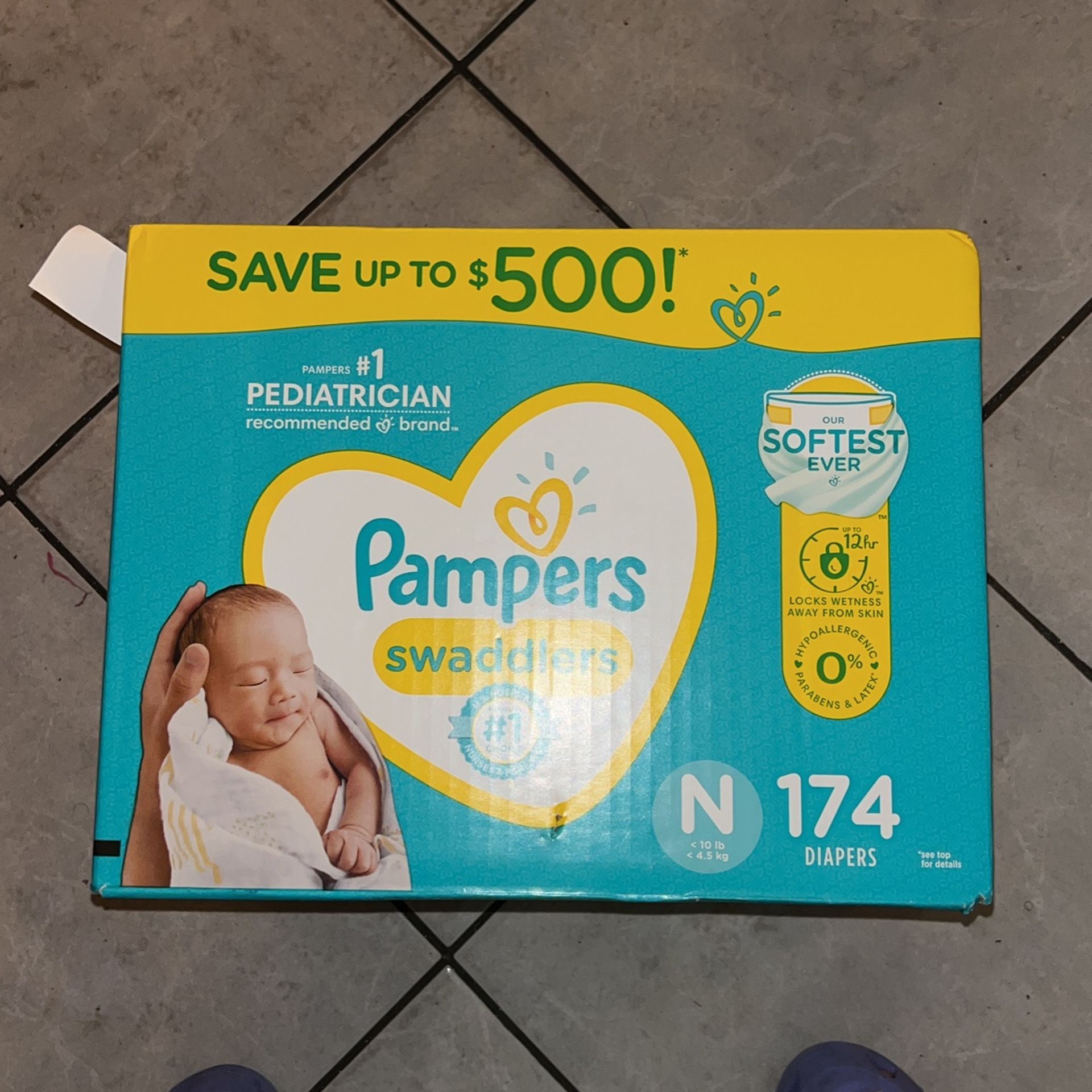 NEVER OPENED NEWBORN PAMPERS