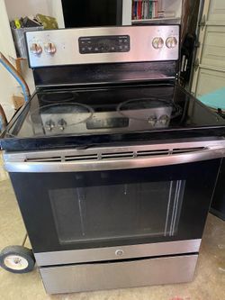 Working great, General Electric range oven for sale