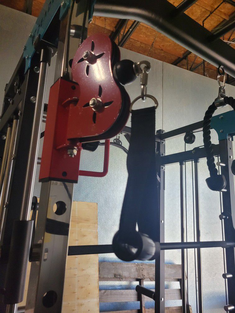 Multifunctional smith machine - a complete home gym system designed to do a comprehensive workout.  Selling as a stand-alone machine for 1,700.  A com