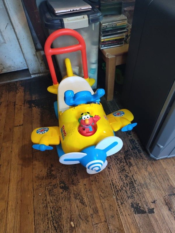 Riding And Walking Toy And Soccer Game Plays With The Kids