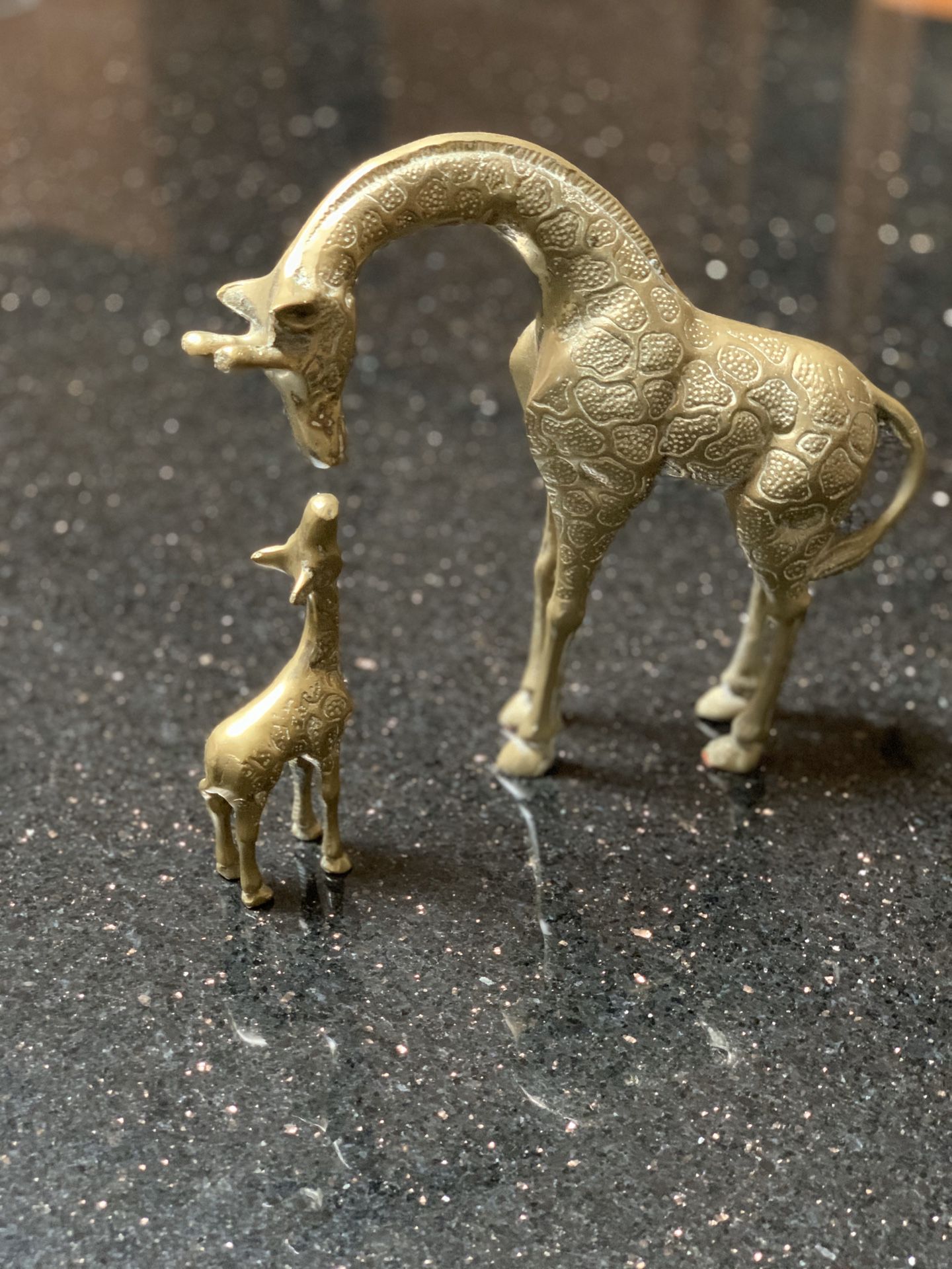Brass antique giraffe and baby