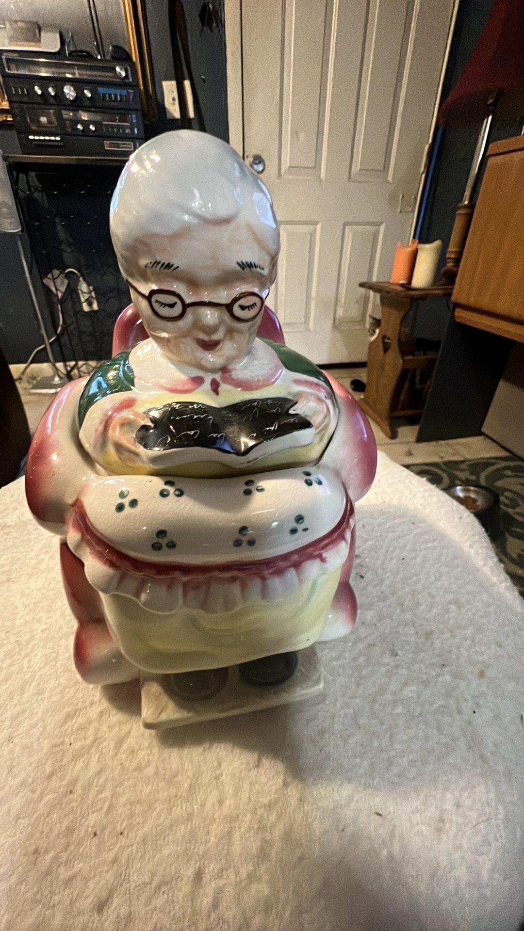 ANTIQUE GRANNY  SITTING ON WHERL CHAIR POTTERY STORAGE