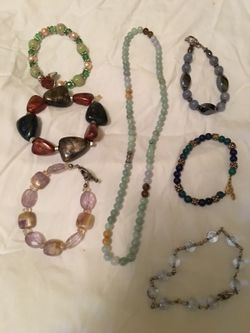6 bracelets and 1 necklace