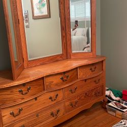 Solid oak wave front dresser and Egg & Dart Beveled mirroe