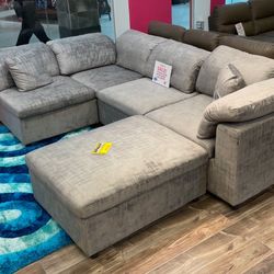 Spring Blowout Sale. Lima Grey Sectional With Ottoman Only $899. Easy Finance Option. Same-Day Delivery.