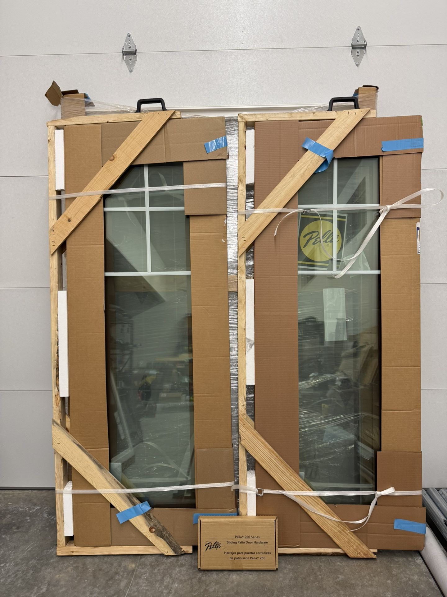 Pella® 250 Series Patio Doors 60x82 frame size actual size of the sliding door is 59 1/2x 81 1/2 comes with sliding screen door and with the handle an