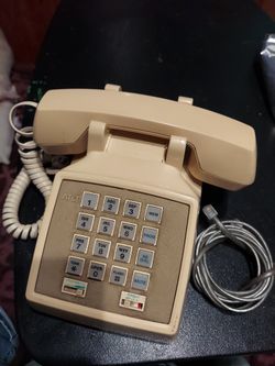 Vintage AT&T Desk Telephone $20.00. Vintage Panasonic Telephone $20.00