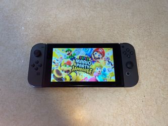 NINTENDO SWITCH + 125 SWITCH GAMES