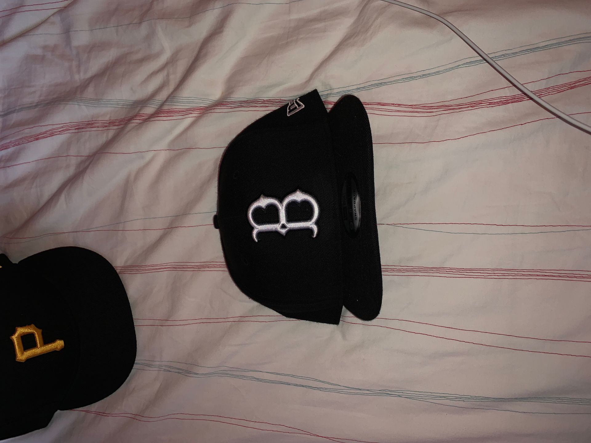 Pirates and brooklyn snapbacks/ blue jays fitted cap 7 3/8. Each $25