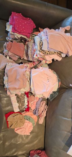 Bassinet and over 100 baby girl clothing.   0-6months