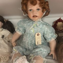 Adorable porcelain Doll