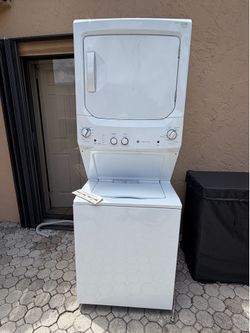 GE Stackable washer/dryer for repair or parts READ