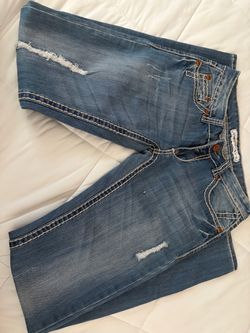 Distressed Light Wash Denim Jeans