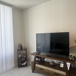 Tv console , coffee table and end table - rooms to go