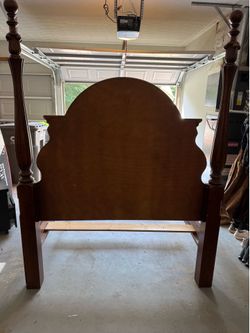 Queen sized wooden bed frame